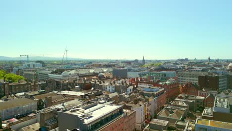 rising aerial of dublin city centre, leinster, ireland on a bright and sunny day. filmed in 4k, 60fps and with rec709 color.
