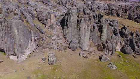 Camping-Tents-In-Middle-Of-Distinctive-Rocks-Formation,-Huaraz-great-Cave,-Peru