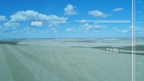 dates and measurements animation over aerial view of expansive farmland