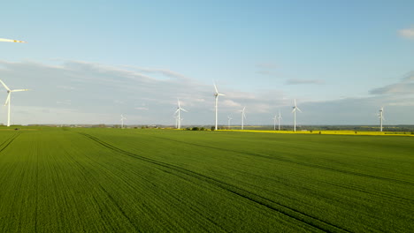 Renewable-energy-windmill-park-in-rural-landscape-of-Lebcz,-Poland