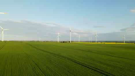 renewable energy windmill park in rural landscape of lebcz, poland
