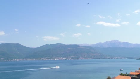 Yacht-crosses-Boka-Kotorska-Bay-in-Adriatic-sea