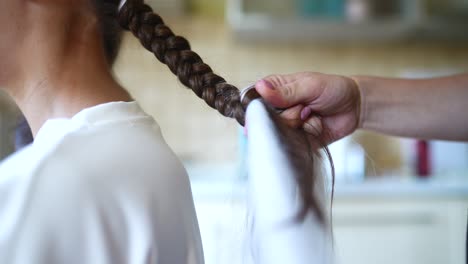 braiding a child's hair