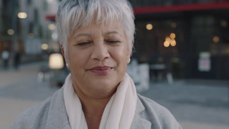 portrait-of-mature-indian-business-woman-in-city-downtown-successful-executive-wearing-scarf