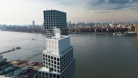 cinematic drone shot flying close to modern skyscraper building