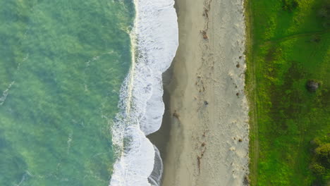 rough ocean in sicily with beach nature background overhead vertical relaxing