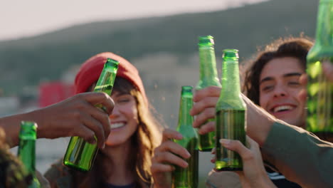 group of multi ethnic friends celebrating rooftop party making toast drinking alcohol enjoying reunion celebration on weekend social gathering at sunset