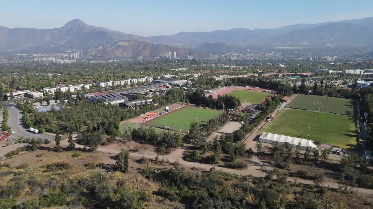 High angle view of the car, chilean high performance center in santiago, chile, with mountains in the background