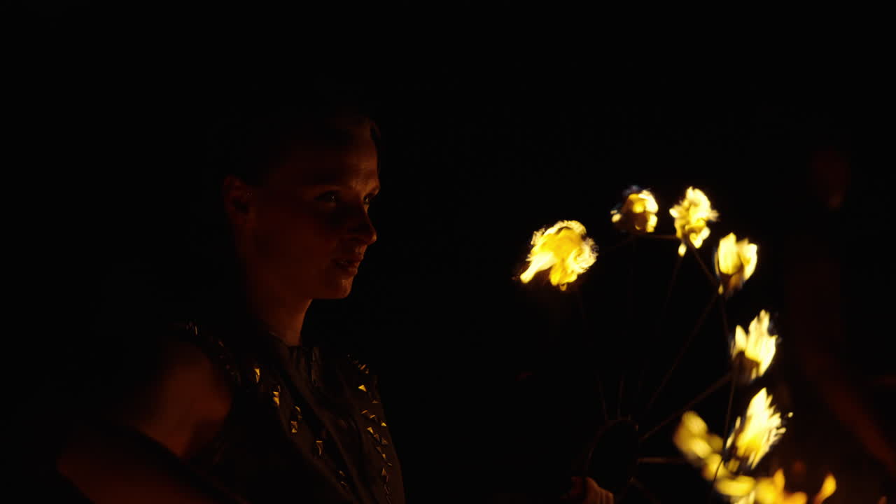 Fire Dancer Performance at Night