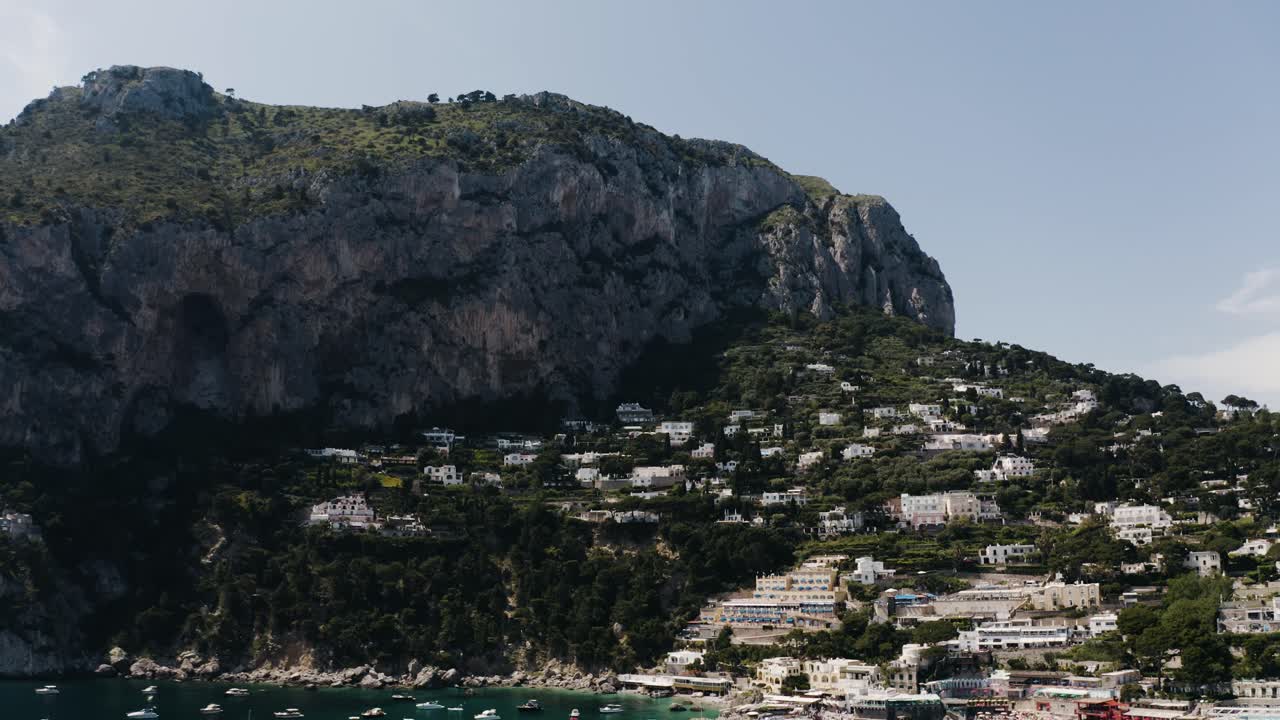 Aerial view of Italy's Marina Piccola with the looming cliffs overhead