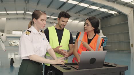 aircraft maintenance team working in hangar