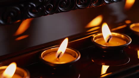 burning candles on an altar