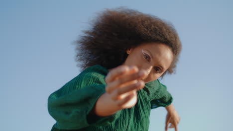 Woman-artist-dancing-sky-close-up.-Girl-performing-freestyle-moving-gracely.