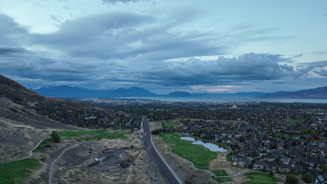 Cedar Hills Golf Club And Mount Timpanogos Temple In The City Of Highland At Dawn In Utah. Aerial Pullback Shot