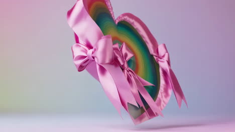 glossy pink heart with ribbon