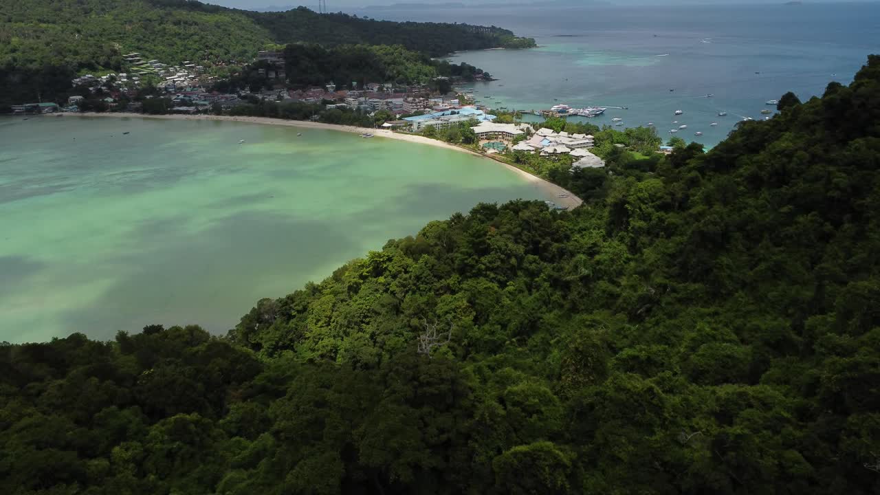 Drone reveal shot of phi phi island&rsquo;s both coastlines