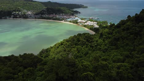Drone reveal shot of phi phi island&rsquo;s both coastlines