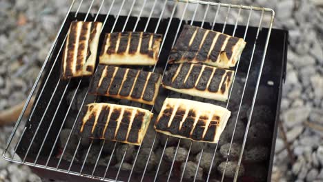 baking tortillas on a grill for uzbek pilaf