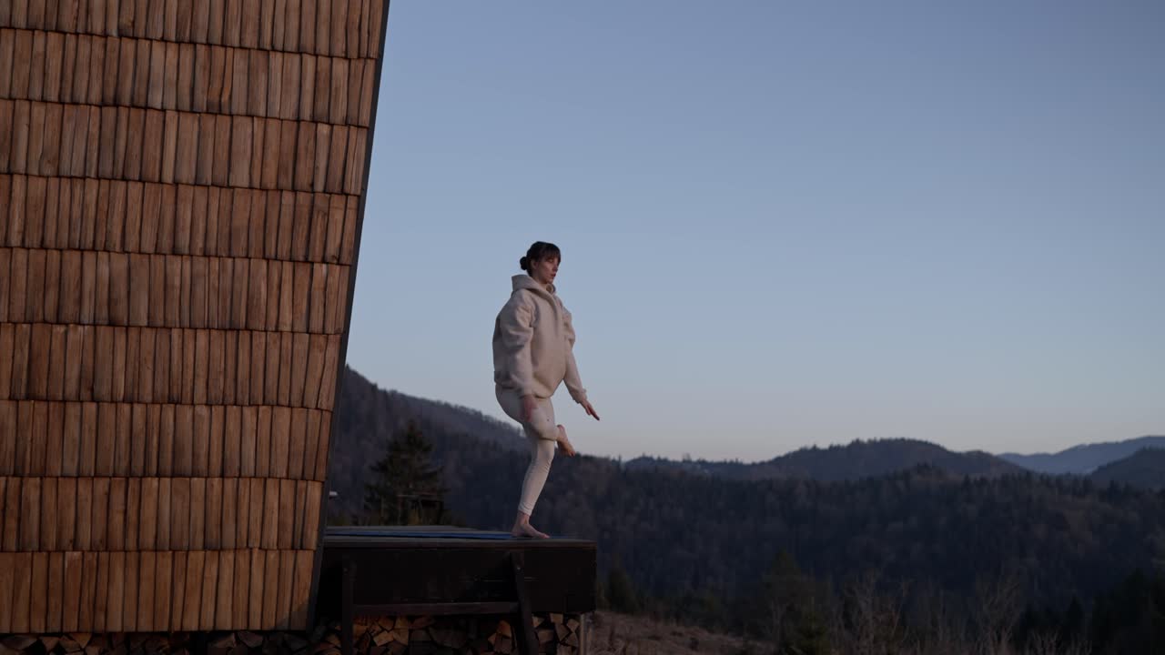 Woman Doing Yoga in the Mountains