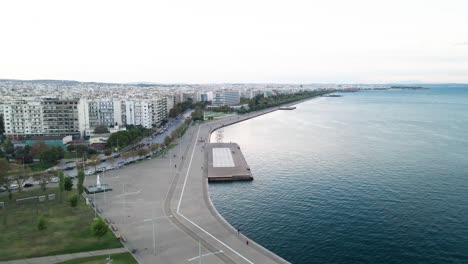4k drone clip steady over the port of thessaloniki in northern greece on a clear morning