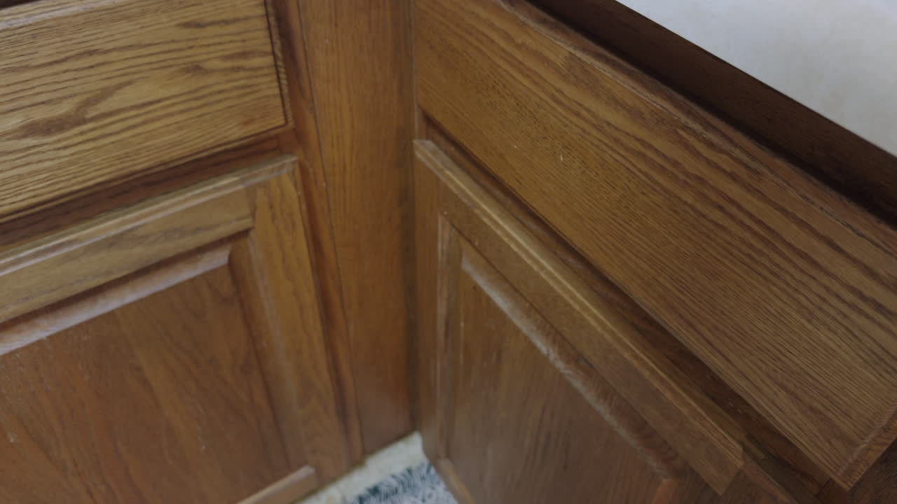 Hand Pulling Open Cutlery Drawer In Kitchen