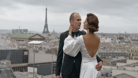 romantic parisian wedding couple on rooftop