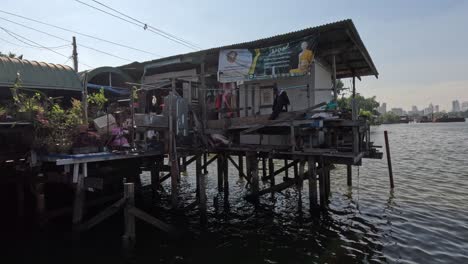 stilt houses over river with gradual activity changes