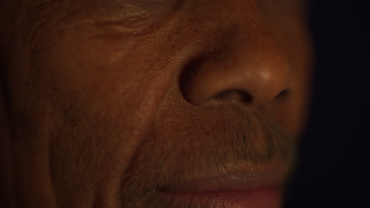 Close-up sad black male eyes