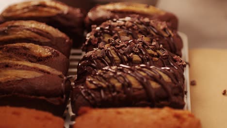 fresh bake double chocolate banana artesian bread in bakery shop close-up. artisan bread is making by skill bakers using natural and high-quality ingredients. food with health and flavour benefits. sweet breads for dessert and breakfast