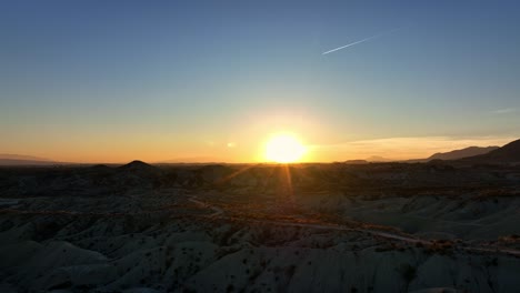 Picturesque-view-of-sunset-over-dry-badlands