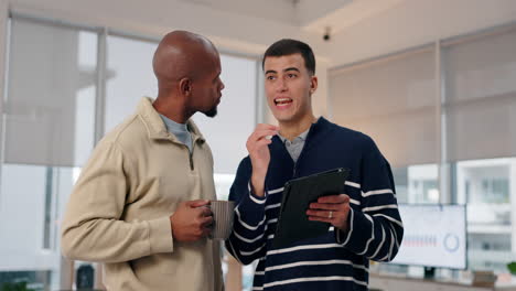 two men having a business meeting in a modern office