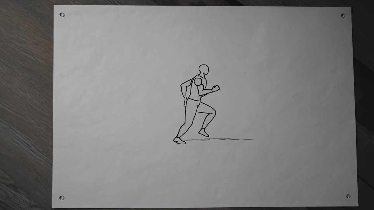 Minimalist black and white animation sketch depicting an athlete running, drawn on a sheet of paper attached to a wooden background, suggesting movement and athleticism