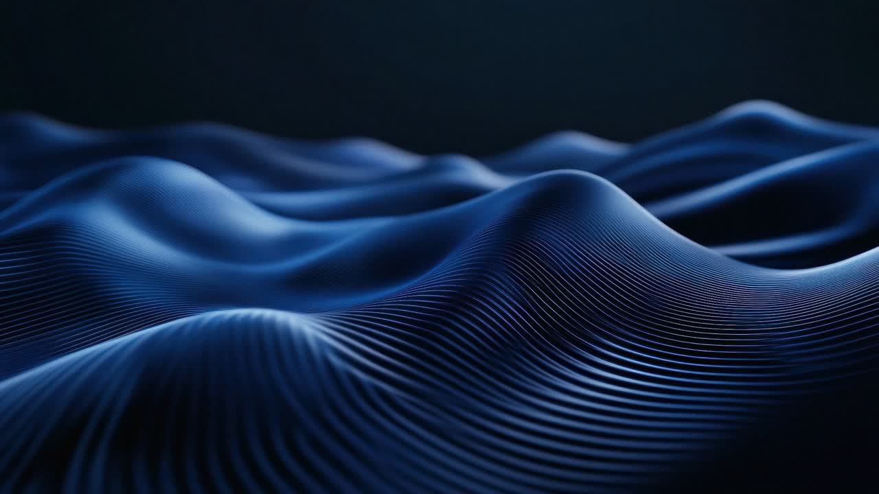 Abstract video of smooth, undulating blue surface with a low-angle shot, creating a futuristic