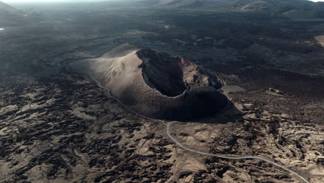 aerial view of volcanic crater and lava fields