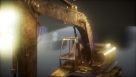excavator in the dark with bright lights