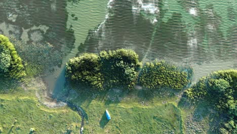 overhead view of lake during summertime. -  aerial