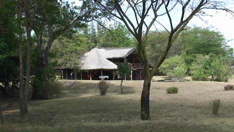 People-walk-around-the-shade-of-their-lodge