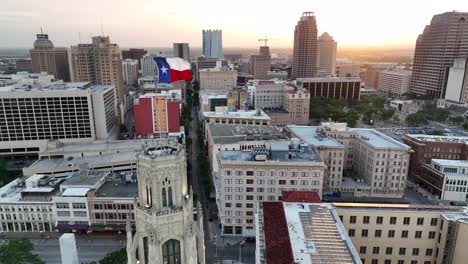 texas flag proudly flies above downtown san antonio tx