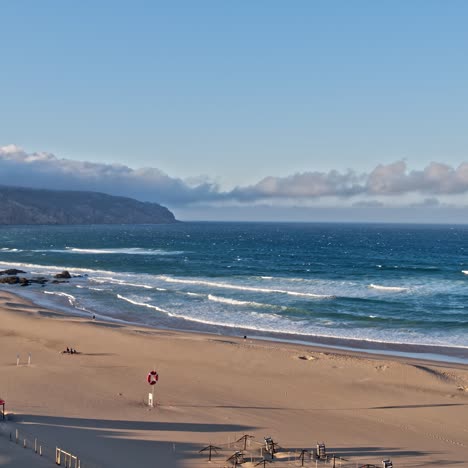 sandy beach in portugal, with cliffs and beautiful coastal scenery coastline landscape