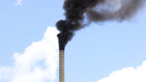 continuous dark smoke emission from a chimney