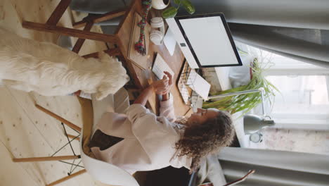 woman working from home with her dog