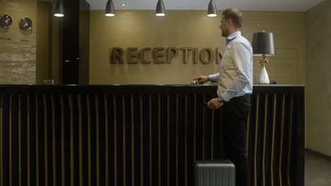 receptionist talking with guest