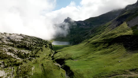 Valley-of-Schynige-Platte-on-a-sunny-day-with-some-clouds-covering-the-mountains