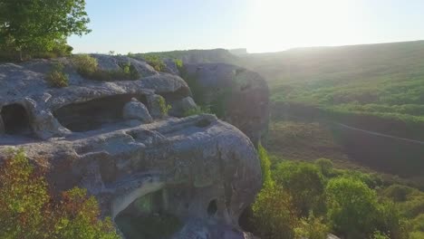 ancient caves in a mountainous landscape