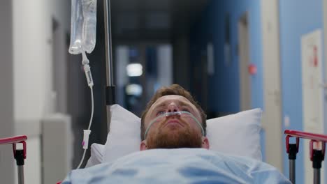 patient in hospital corridor