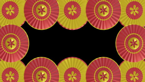 animation of chinese red and gold floral pattern on black background