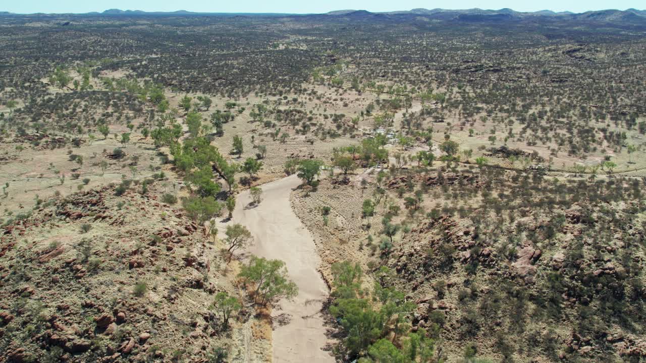 Aerial view of the dry Todd River upstream of the Telegraph Station, north of Alice Springs, Mparntwe, Northern Territory, Australia. August 2022.