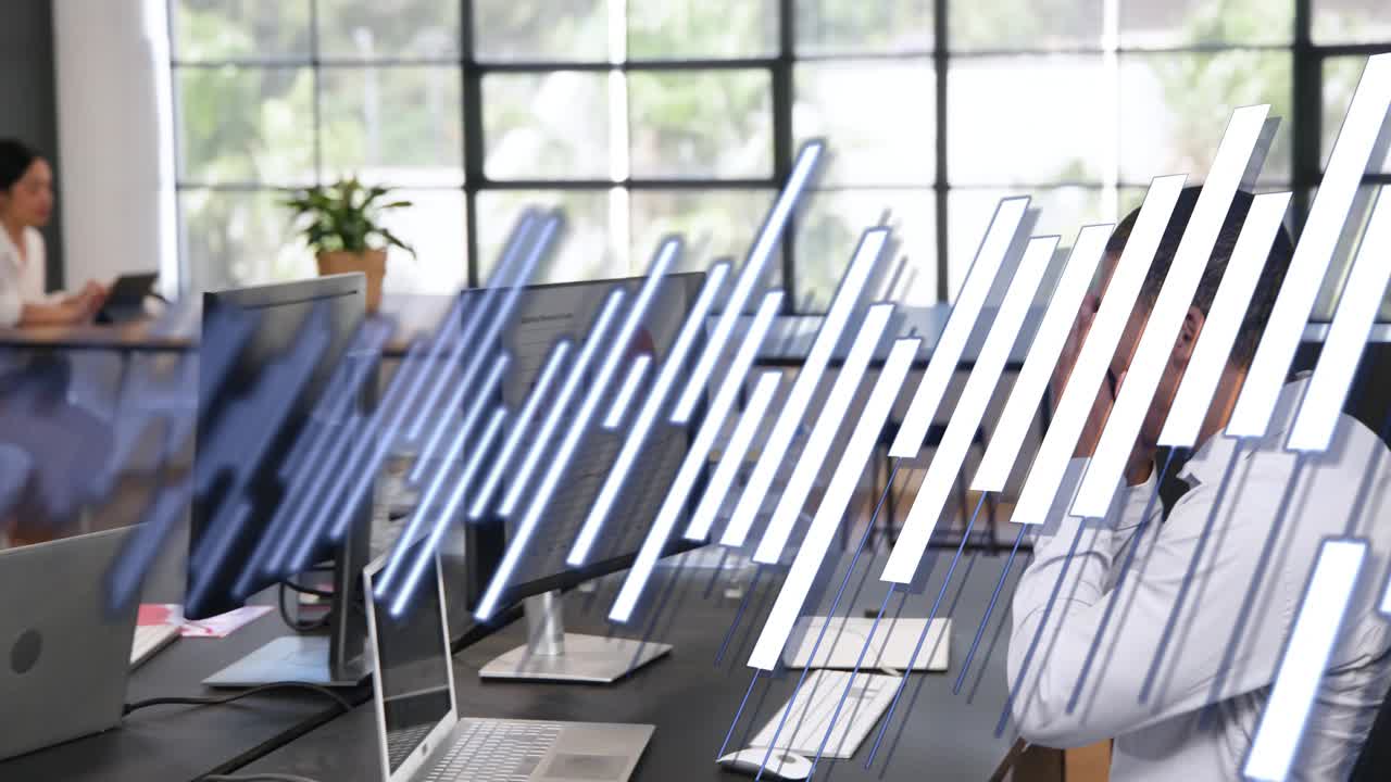 Man entering asking question, walking to desk and typing to work, diagonal bars overlaying office