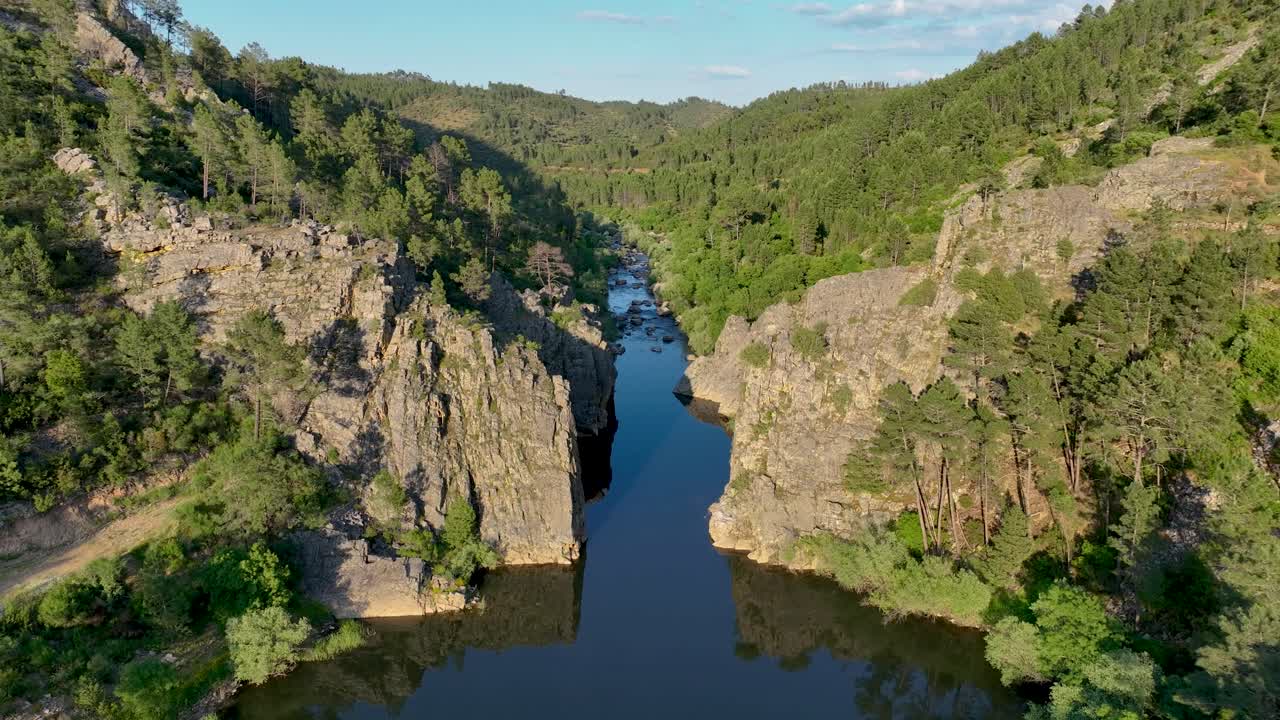 Aerial view of Arco do Fratel at Foz do Cobrao, where the Ocreza River carves through dramatic cliffs before joining the Tejo. A stunning Beira Baixa landscape.