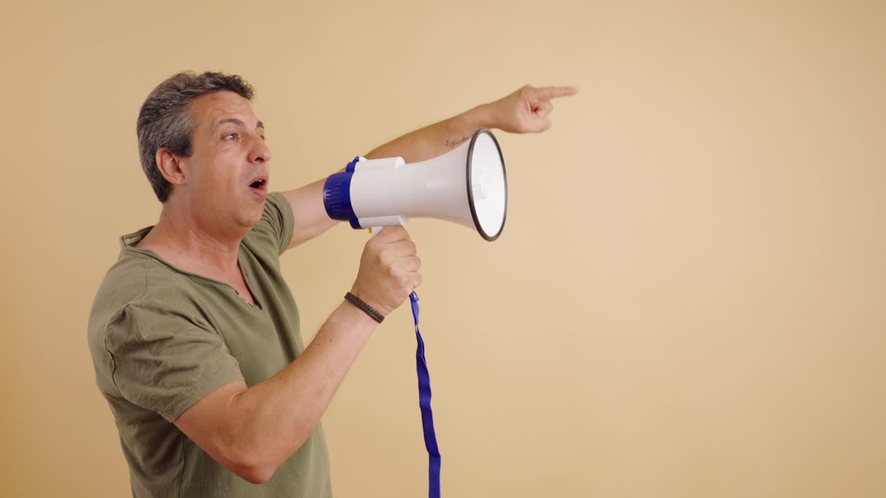 Man speaking into megaphone